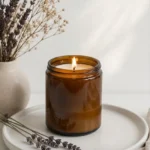DIY cozy brown soy wax candle on white plate for warm ambiance