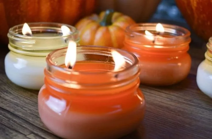 Homemade DIY candle and wax melt creations in an assortment of colors and scents.