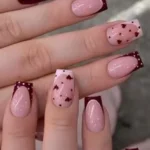 Stylish French tip nails perfect for Valentine's Day celebration