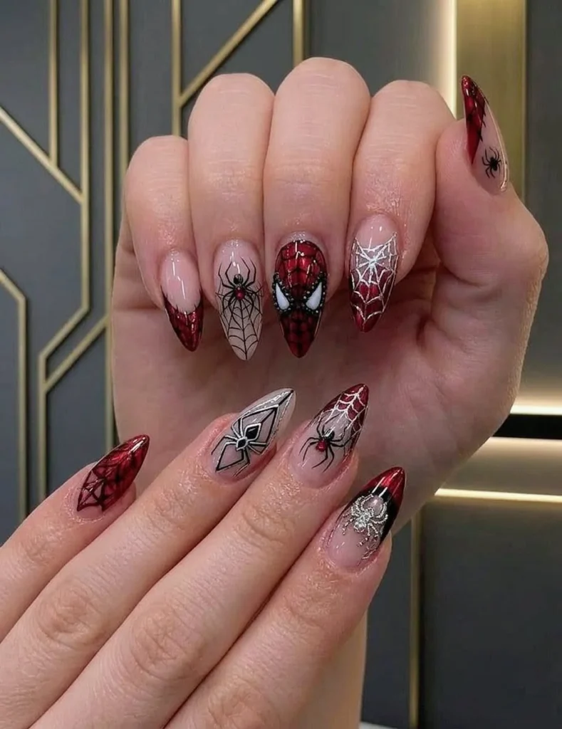 Stylish spider nails design featuring intricate patterns and colors.