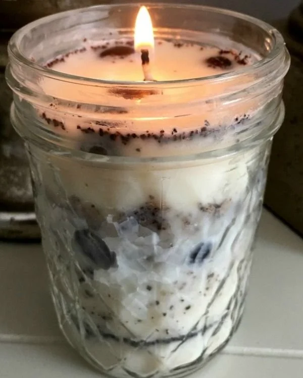 Homemade coffee bean soy candle tutorial for beginners showcasing the candle-making process.