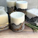 DIY concrete geode candles in various colors and styles.