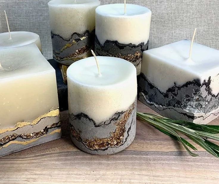 DIY concrete geode candles in various colors and styles.