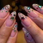 Luxury rhinestone French tip nails with sparkly crystals and custom press-on designs