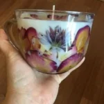 Homemade pressed flower candles in vintage teacups for DIY decor