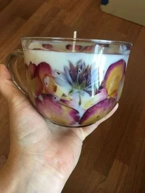 Homemade pressed flower candles in vintage teacups for DIY decor