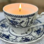 DIY soy candles made in unique containers from charity shops.