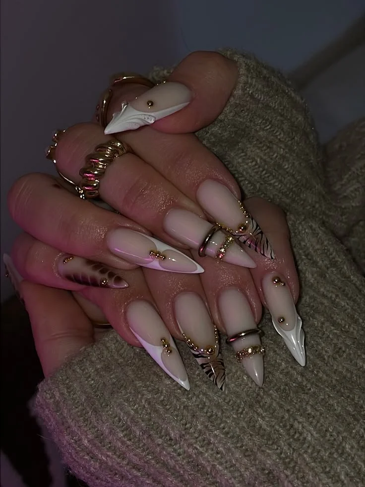 DIY silhouette nail art featuring strass and pearls for a stunning look