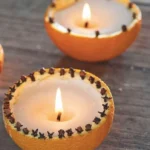 DIY orange peel candles for autumn decor with tea lights