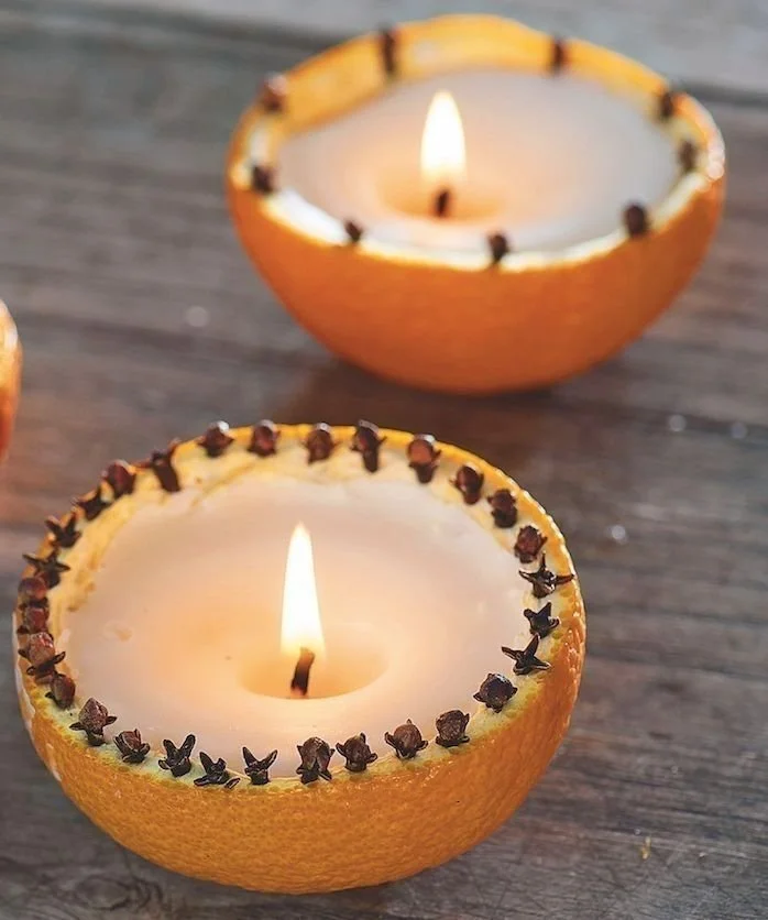DIY orange peel candles for autumn decor with tea lights