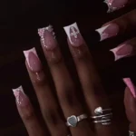Stylish quartz nails in various shapes, including medium square and duck tip.