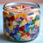 Handmade candles crafted with candle sand showcasing unique designs and vibrant colors.