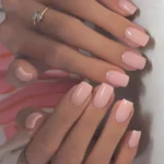 Beautifully manicured BIAB nails showcasing the latest nail trend.