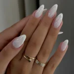 Elegant white French tip nails design for a stylish look in 2026.