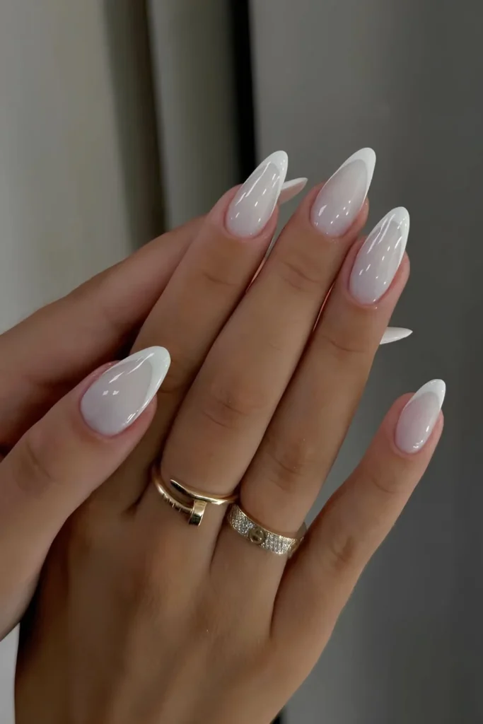 Elegant white French tip nails design for a stylish look in 2026.